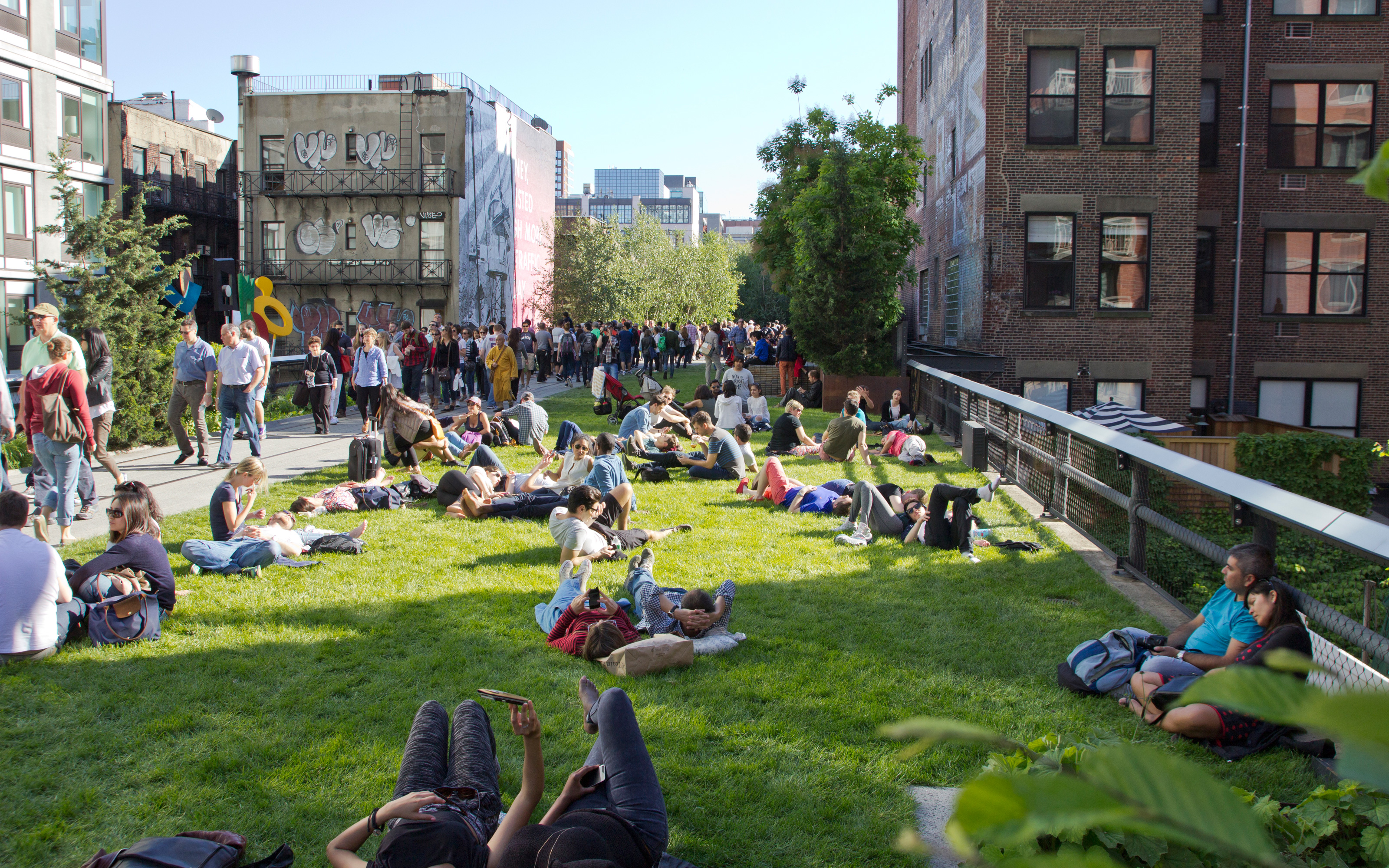 The section 2 contains also a lawn which can be used for sunbathing. Lawn with lots of people sunbathing